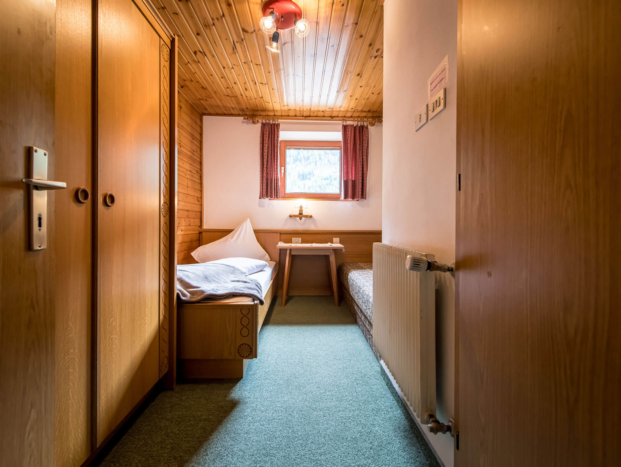 Camera singola con tavolino e divano - Pensione Oberwirt